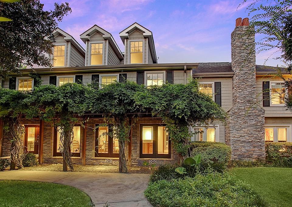 three story large brick house